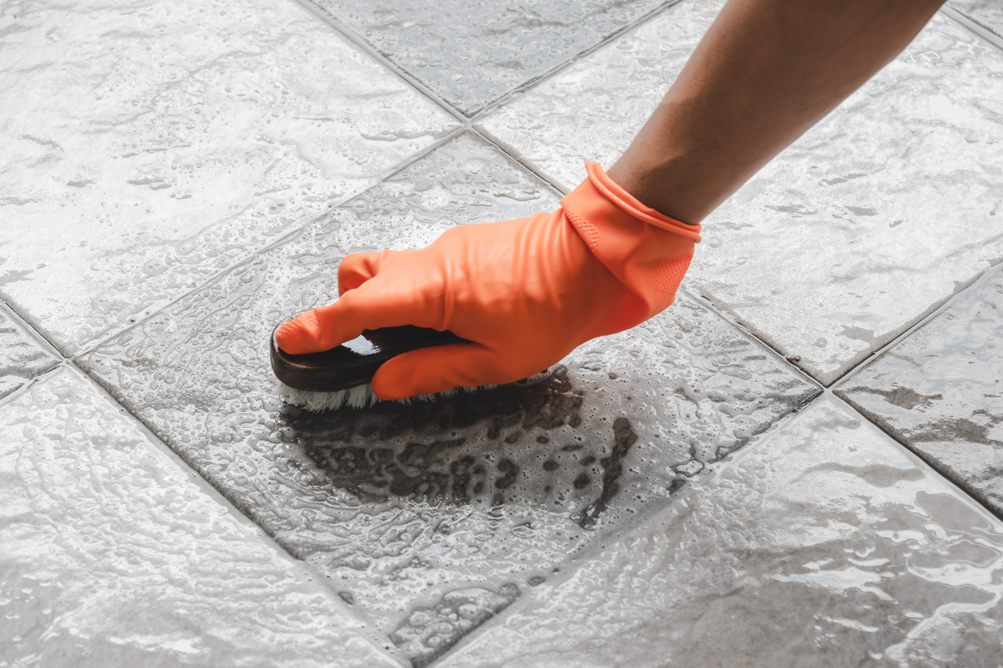 what do professionals use to clean grout
